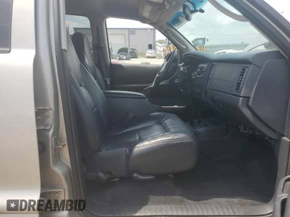2001 Dodge Durango with VIN 1B4HS28N21F620093, listed as a Copart auction lot 64295925 with 144,498 mi miles and Salvage title. Bid and sale history available at DreamBid. Image 7.