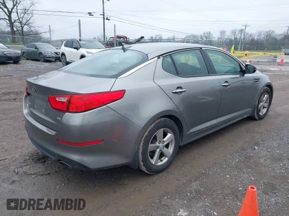 2015 Kia Optima LX with VIN 5XXGM4A75FG519381, listed as a IAAI auction lot 38926243 with 140,591 mi miles and . Bid and sale history available at DreamBid. Image 4.