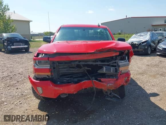 2018 Chevrolet Silverado 1500 LT with VIN 3GCUKREC6JG142529, listed as a IAAI auction lot 43126958 with 117,342 mi miles and . Bid and sale history available at DreamBid. Image 12.