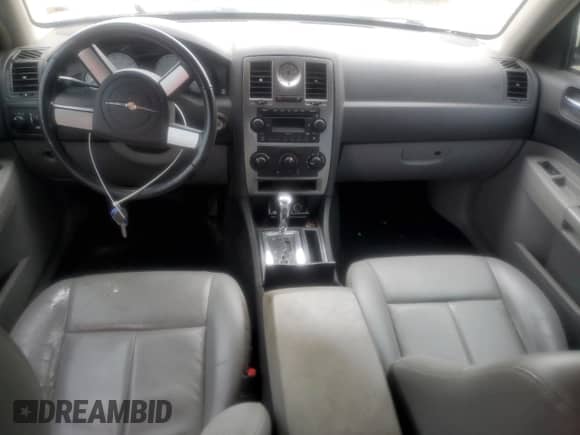 2006 Chrysler 300 Touring с VIN 2C3KA53GX6H499152, выставлен на аукционе Copart как лот 82086315 с пробегом 210 480 миль миль и Списание • Salvage title. История ставок и продаж доступна на DreamBid. Изображение 8.