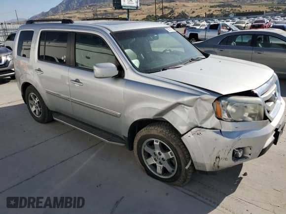 2009 Honda Pilot Touring с VIN 5FNYF48929B048741, выставлен на аукционе Copart как лот 65014975 с пробегом 131 273 миль миль и Списание • Salvage title. История ставок и продаж доступна на DreamBid. Изображение 4.