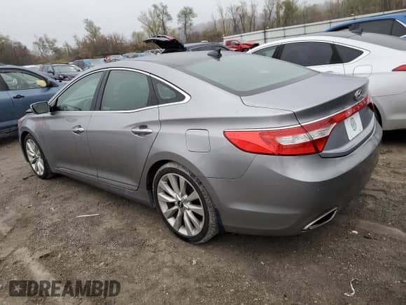2014 Hyundai Azera Limited с VIN KMHFH4JG3EA418393, выставлен на аукционе Copart как лот 80462094 с пробегом 148 317 миль миль и Списание • Salvage title. История ставок и продаж доступна на DreamBid. Изображение 2.