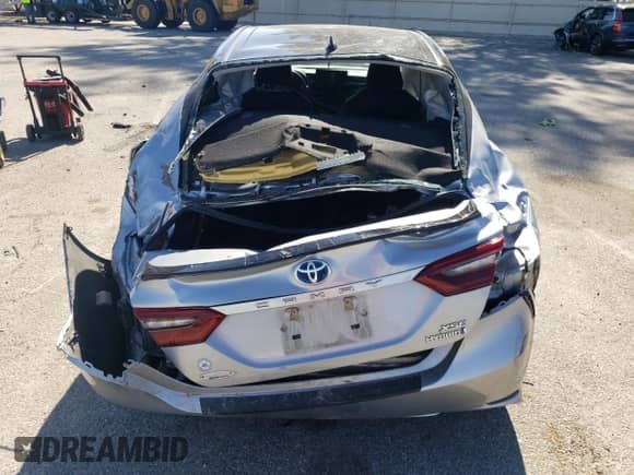 2022 Toyota Camry Hybrid XSE с VIN 4T1K31AK0NU044226, выставлен на аукционе Copart как лот 45727205 с пробегом 59 879 миль миль и Списание • Salvage title. История ставок и продаж доступна на DreamBid. Изображение 6.