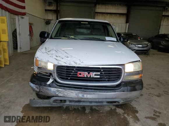 2002 GMC Sierra 1500 z VIN 1GTEC14W22Z149901, wystawiony jako Copart lot #60996325 z przebiegiem 243 259 mil mil oraz Czysty tytuł • Clean title. Historia ofert i sprzedaży dostępna na DreamBid. Obrazek 5.