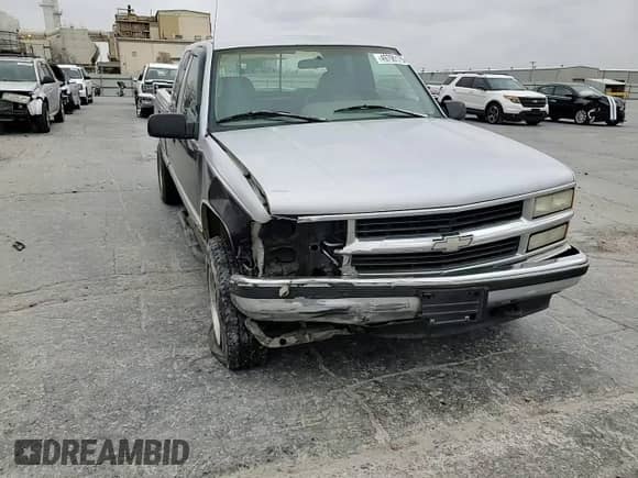 1995 Chevrolet Silverado 2500 с VIN 2GCFK29K6S1239533, выставлен на аукционе Copart как лот 49790175 с пробегом 55 840 миль миль и Списание • Salvage title. История ставок и продаж доступна на DreamBid. Изображение 11.