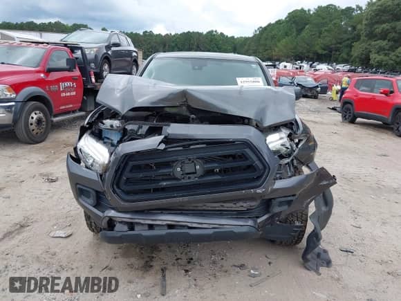 2020 Toyota Tacoma SR with VIN 3TMCZ5AN4LM314973, listed as a IAAI auction lot 42955800 with 94,693 mi miles and . Bid and sale history available at DreamBid. Image 12.
