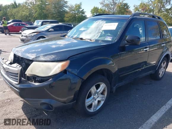 2009 Subaru Forester X with VIN JF2SH63689H734681, listed as a IAAI auction lot 43310176 with 296,187 mi miles and . Bid and sale history available at DreamBid. Image 2.