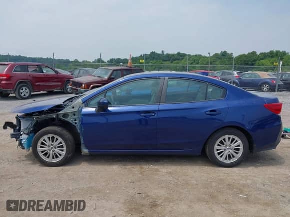 2018 Subaru Impreza Premium with VIN 4S3GKAB64J3604540, listed as a IAAI auction lot 42424421 with 73,961 mi miles and . Bid and sale history available at DreamBid. Image 14.