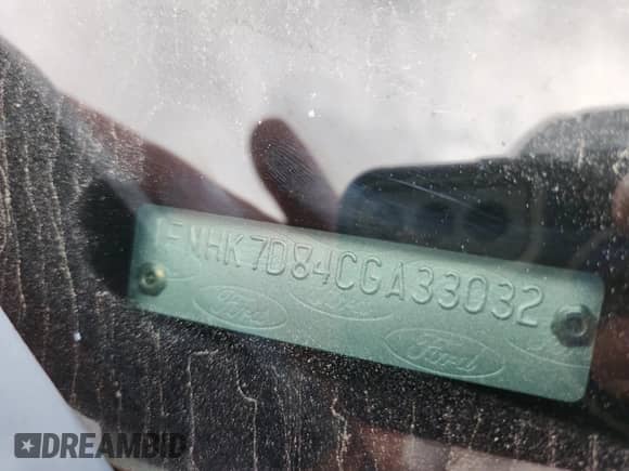 2012 Ford Explorer XLT z VIN 1FMHK7D84CGA33032, wystawiony jako Copart lot #82189625 z przebiegiem 202 760 mil mil oraz Szkoda całkowita • Salvage title. Historia ofert i sprzedaży dostępna na DreamBid. Obrazek 13.