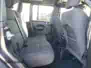 2023 Jeep Wrangler Willys с VIN 1C4HJXDN8PW509467, выставлен на аукционе Copart как лот 82009845 с пробегом 13 040 миль миль и Списание • Salvage title. История ставок и продаж доступна на DreamBid. Изображение 11.