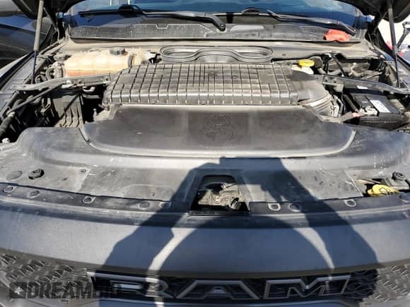 2022 Ram 1500 TRX z VIN 1C6SRFU96NN151419, wystawiony jako Copart lot #70125925 z przebiegiem 76 407 mil mil oraz Szkoda całkowita • Salvage title. Historia ofert i sprzedaży dostępna na DreamBid. Obrazek 11.