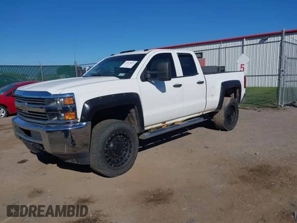 2015 Chevrolet Silverado 2500HD Work Truck with VIN 1GC2KUEG1FZ143186, listed as a IAAI auction lot 43275855 with 194,710 mi miles and . Bid and sale history available at DreamBid. Image 2.
