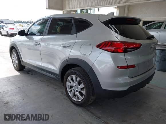 2019 Hyundai Tucson SE z VIN KM8J23A42KU841195, wystawiony jako IAAI lot #43476165 z przebiegiem 129 645 mil mil oraz . Historia ofert i sprzedaży dostępna na DreamBid. Obrazek 3.