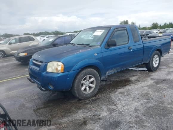 2003 Nissan Frontier XE z VIN 1N6DD26T93C424697, wystawiony jako IAAI lot #42015805 z przebiegiem 148 351 mil mil oraz . Historia ofert i sprzedaży dostępna na DreamBid. Obrazek 2.
