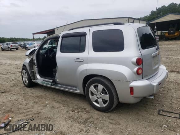 2009 Chevrolet HHR LS with VIN 3GNCA13B09S599282, listed as a Copart auction lot 56941385 with 95,674 mi miles and Salvage title. Bid and sale history available at DreamBid. Image 2.