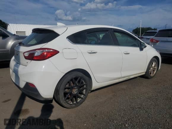 2018 Chevrolet Cruze LT с VIN 3G1BE6SM8JS570618, выставлен на аукционе Copart как лот 63690245 с пробегом 135 712 миль миль и Чистый • Clean title. История ставок и продаж доступна на DreamBid. Изображение 3.