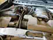 2018 Chevrolet Silverado 1500 LT z VIN 3GCUKREC9JG213996, wystawiony jako Copart lot #70379115 z przebiegiem 104 786 mil mil oraz Szkoda całkowita • Salvage title. Historia ofert i sprzedaży dostępna na DreamBid. Obrazek 13.