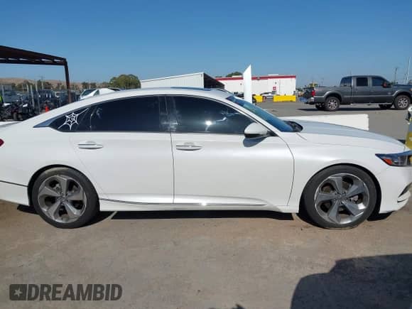 2018 Honda Accord Touring с VIN 1HGCV1F94JA107639, выставлен на аукционе IAAI как лот 42482273 с пробегом 92 594 миль миль и . История ставок и продаж доступна на DreamBid. Изображение 13.
