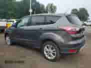 2017 Ford Escape SE z VIN 1FMCU9GD1HUA69276, wystawiony jako Copart lot #66504355 z przebiegiem 131 784 mil mil oraz Czysty tytuł • Clean title. Historia ofert i sprzedaży dostępna na DreamBid. Obrazek 2.