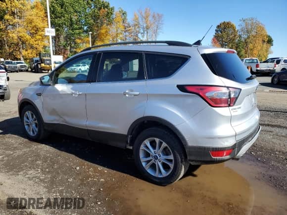 2018 Ford Escape SE с VIN 1FMCU9GD3JUB79087, выставлен на аукционе Copart как лот 89517475 с пробегом 92 909 миль миль и Чистый • Clean title. История ставок и продаж доступна на DreamBid. Изображение 2.