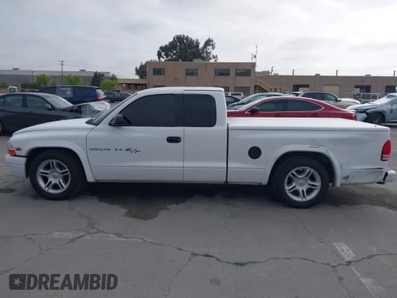 2000 Dodge Dakota Sport with VIN 1B7GL22ZXYS526021, listed as a IAAI auction lot 42153004 with 67,542 mi miles and . Bid and sale history available at DreamBid. Image 14.