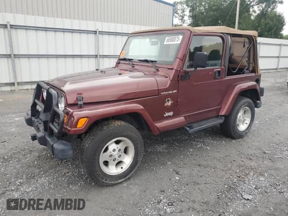 2002 Jeep Wrangler Sahara с VIN 1J4FA59S72P766921, выставлен на аукционе Copart как лот 66980875 с пробегом 173 401 миль миль и Списание • Salvage title. История ставок и продаж доступна на DreamBid. Изображение 1.