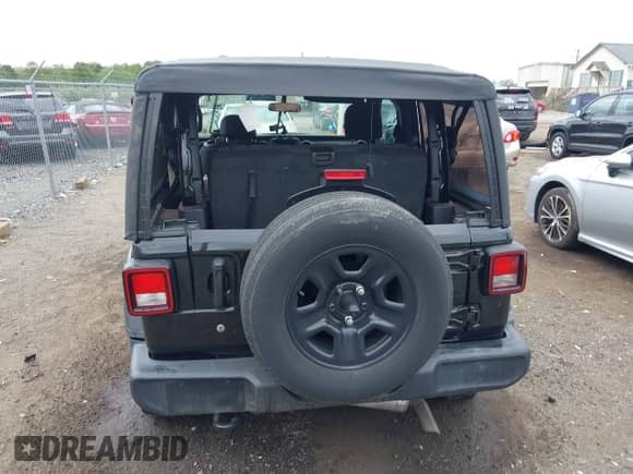 2023 Jeep Wrangler Sport with VIN 1C4GJXAN6PW572616, listed as a IAAI auction lot 43040597 with 44,476 mi miles and . Bid and sale history available at DreamBid. Image 17.