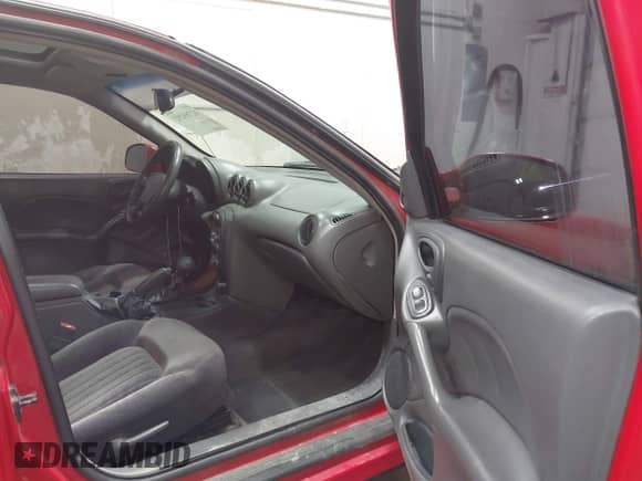 2000 Pontiac Grand Am GT z VIN 1G2NW52E4YM779647, wystawiony jako IAAI lot #42769292 z przebiegiem 200 419 mil mil oraz . Historia ofert i sprzedaży dostępna na DreamBid. Obrazek 5.