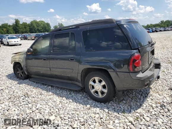 2003 Chevrolet TrailBlazer EXT LT z VIN 1GNET16S736149882, wystawiony jako Copart lot #63850545 z przebiegiem Nie podano mil oraz Szkoda całkowita • Salvage title. Historia ofert i sprzedaży dostępna na DreamBid. Obrazek 2.