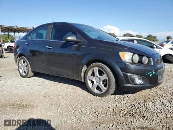 2014 Chevrolet Sonic LTZ with VIN 1G1JE5SB1E4193317, listed as a Copart auction lot 71230705 with Not provided miles and Salvage title. Bid and sale history available at DreamBid. Image 4.