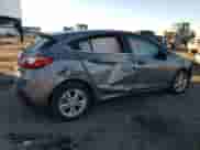 2018 Chevrolet Cruze LT z VIN 3G1BH6SE3JS636492, wystawiony jako Copart lot #80988884 z przebiegiem Nie podano mil oraz Szkoda całkowita • Salvage title. Historia ofert i sprzedaży dostępna na DreamBid. Obrazek 3.