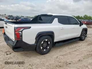 2024 Chevrolet Silverado EV RST z VIN 1GC40ZEL3RU302266, wystawiony jako Copart lot #59668065 z przebiegiem 6 928 mil mil oraz Szkoda całkowita • Salvage title. Historia ofert i sprzedaży dostępna na DreamBid. Obrazek 3.