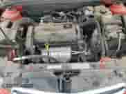 2015 Chevrolet Cruze LS z VIN 1G1PA5SH9F7195701, wystawiony jako Copart lot #53109135 z przebiegiem 112 793 mil mil oraz Szkoda całkowita • Salvage title. Historia ofert i sprzedaży dostępna na DreamBid. Obrazek 11.