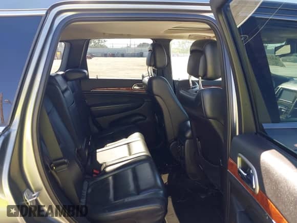 2012 Jeep Grand Cherokee Limited z VIN 1C4RJEBG1CC305182, wystawiony jako IAAI lot #43527445 z przebiegiem 164 219 mil mil oraz . Historia ofert i sprzedaży dostępna na DreamBid. Obrazek 8.