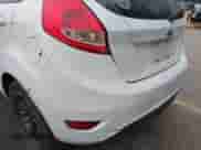 2013 Ford Fiesta S z VIN 3FADP4TJ1DM222984, wystawiony jako IAAI lot #42766623 z przebiegiem 228 073 mil mil oraz . Historia ofert i sprzedaży dostępna na DreamBid. Obrazek 16.