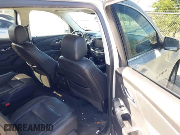 2021 Chevrolet Traverse Premier with VIN 1GNEVKKWXMJ198159, listed as a IAAI auction lot 41616691 with 80,229 mi miles and . Bid and sale history available at DreamBid. Image 8.