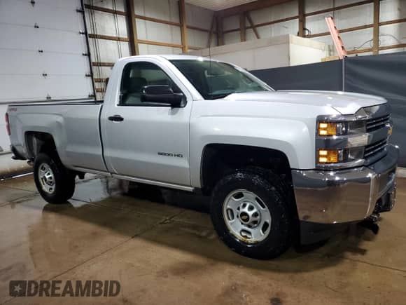 2015 Chevrolet Silverado 2500HD Work Truck with VIN 1GC0KUEG9FZ525988, listed as a Copart auction lot 60221745 with 10,918 mi miles and Clean title. Bid and sale history available at DreamBid. Image 4.