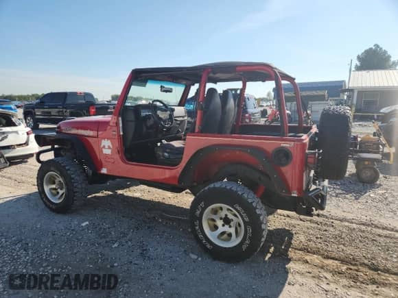1999 Jeep Wrangler Sport с VIN 1J4FY19S8XP458426, выставлен на аукционе Copart как лот 71040775 с пробегом 256 600 миль миль и Чистый • Clean title. История ставок и продаж доступна на DreamBid. Изображение 2.
