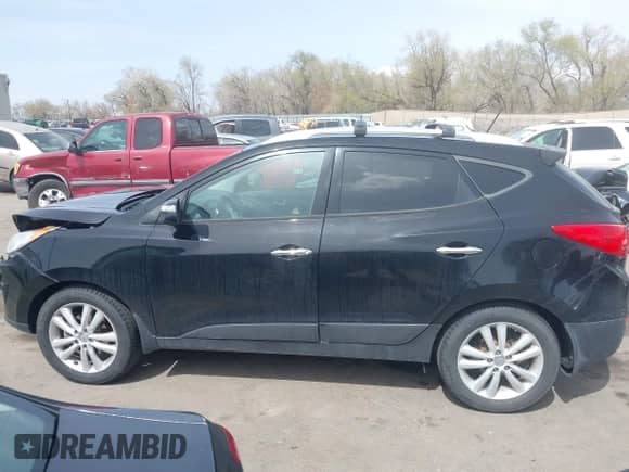 2013 Hyundai Tucson GLS с VIN KM8JUCAC7DU608465, выставлен на аукционе IAAI как лот 41990289 с пробегом 85 358 миль миль и . История ставок и продаж доступна на DreamBid. Изображение 14.