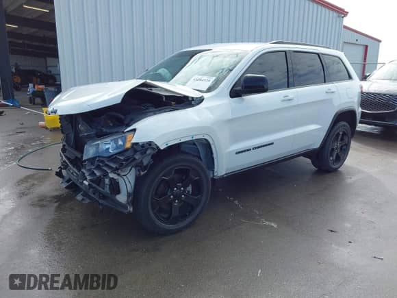2018 Jeep Grand Cherokee Laredo E with VIN 1C4RJFAG1JC370361, listed as a IAAI auction lot 43284928 with 75,952 mi miles and . Bid and sale history available at DreamBid. Image 2.