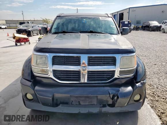 2007 Dodge Nitro SLT с VIN 1D8GT58K17W736432, выставлен на аукционе Copart как лот 84244375 с пробегом 203 027 миль миль и Списание • Salvage title. История ставок и продаж доступна на DreamBid. Изображение 5.