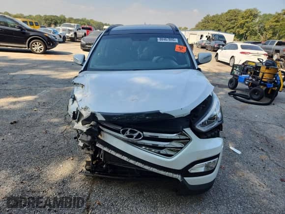 2016 Hyundai Santa Fe с VIN 5XYZU3LB6GG354913, выставлен на аукционе Copart как лот 80467895 с пробегом Не указан миль и Списание • Salvage title. История ставок и продаж доступна на DreamBid. Изображение 5.