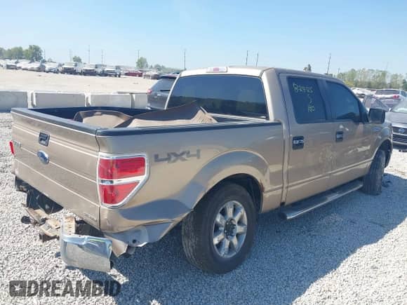2013 Ford F-150 XLT with VIN 1FTFW1EF0DKE25224, listed as a IAAI auction lot 43214853 with 121,324 mi miles and . Bid and sale history available at DreamBid. Image 4.