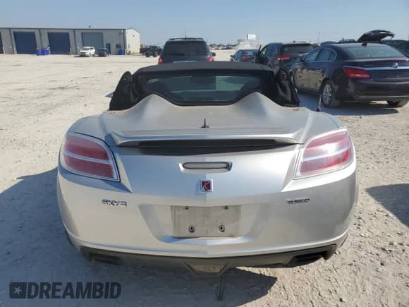 2009 Saturn Sky Red Line with VIN 1G8MT35X69Y106090, listed as a Copart auction lot 59311614 with 76,224 mi miles and Clean title. Bid and sale history available at DreamBid. Image 6.