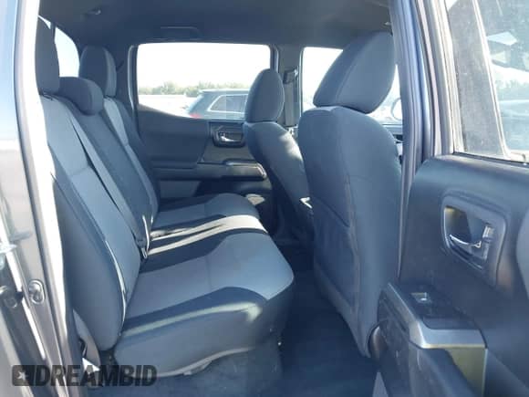 2020 Toyota Tacoma SR5 with VIN 3TMCZ5AN8LM296929, listed as a IAAI auction lot 43118349 with 68,020 mi miles and . Bid and sale history available at DreamBid. Image 8.