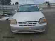 2005 Hyundai Accent GLS z VIN KMHCG45C25U604342, wystawiony jako Copart lot #85380125 z przebiegiem 165 690 mil mil oraz Czysty tytuł • Clean title. Historia ofert i sprzedaży dostępna na DreamBid. Obrazek 5.