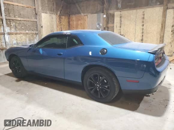 2020 Dodge Challenger SXT with VIN 2C3CDZGG6LH220952, listed as a Copart auction lot 82417474 with 54,163 mi miles and Salvage title. Bid and sale history available at DreamBid. Image 2.