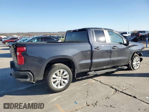 2023 Chevrolet Silverado 1500 Custom with VIN 1GCRABEKXPZ267498, listed as a Copart auction lot 85582474 with 32,599 mi miles and Salvage title. Bid and sale history available at DreamBid. Image 3.