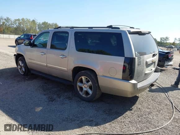 2009 Chevrolet Suburban LTZ z VIN 1GNFK363X9R189568, wystawiony jako IAAI lot #43251361 z przebiegiem 214 783 mil mil oraz . Historia ofert i sprzedaży dostępna na DreamBid. Obrazek 3.
