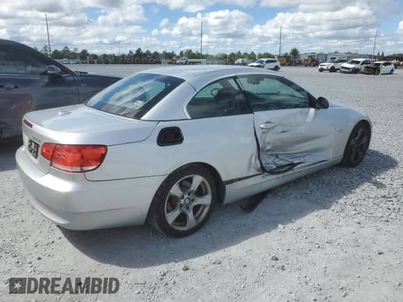 2009 BMW 3 Series 328i with VIN WBAWR33599P460929, listed as a Copart auction lot 84867615 with 123,688 mi miles and Salvage title. Bid and sale history available at DreamBid. Image 3.